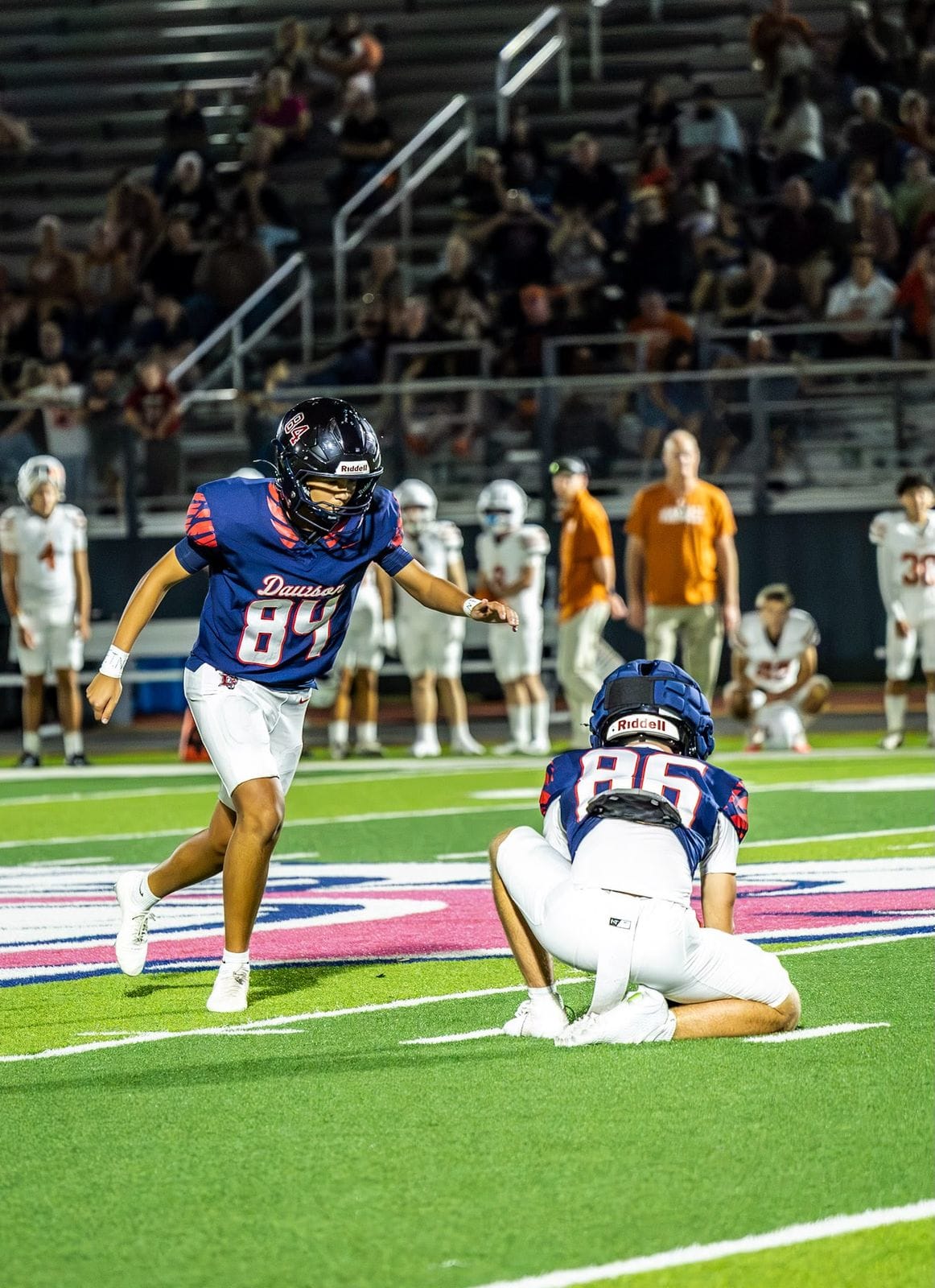Oliver Abela lining up a field goal with his holder